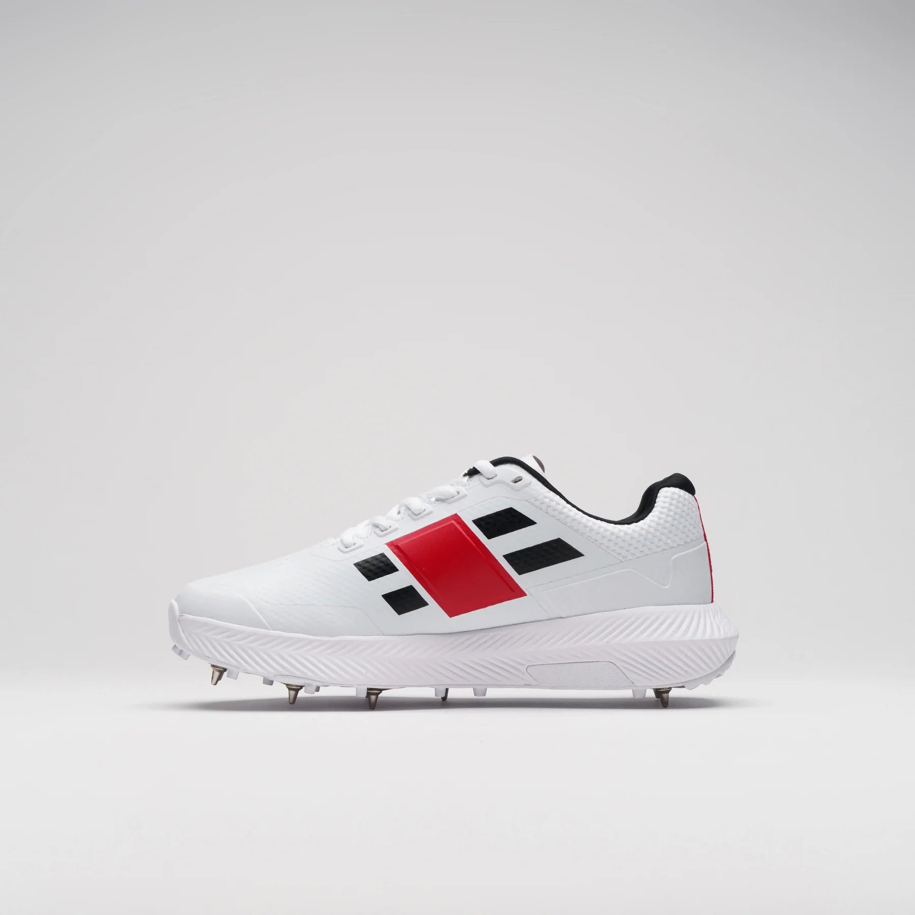 Revo Pro 1.0 Spike Adult Shoes - Unleash Explosive Performance & Comfort